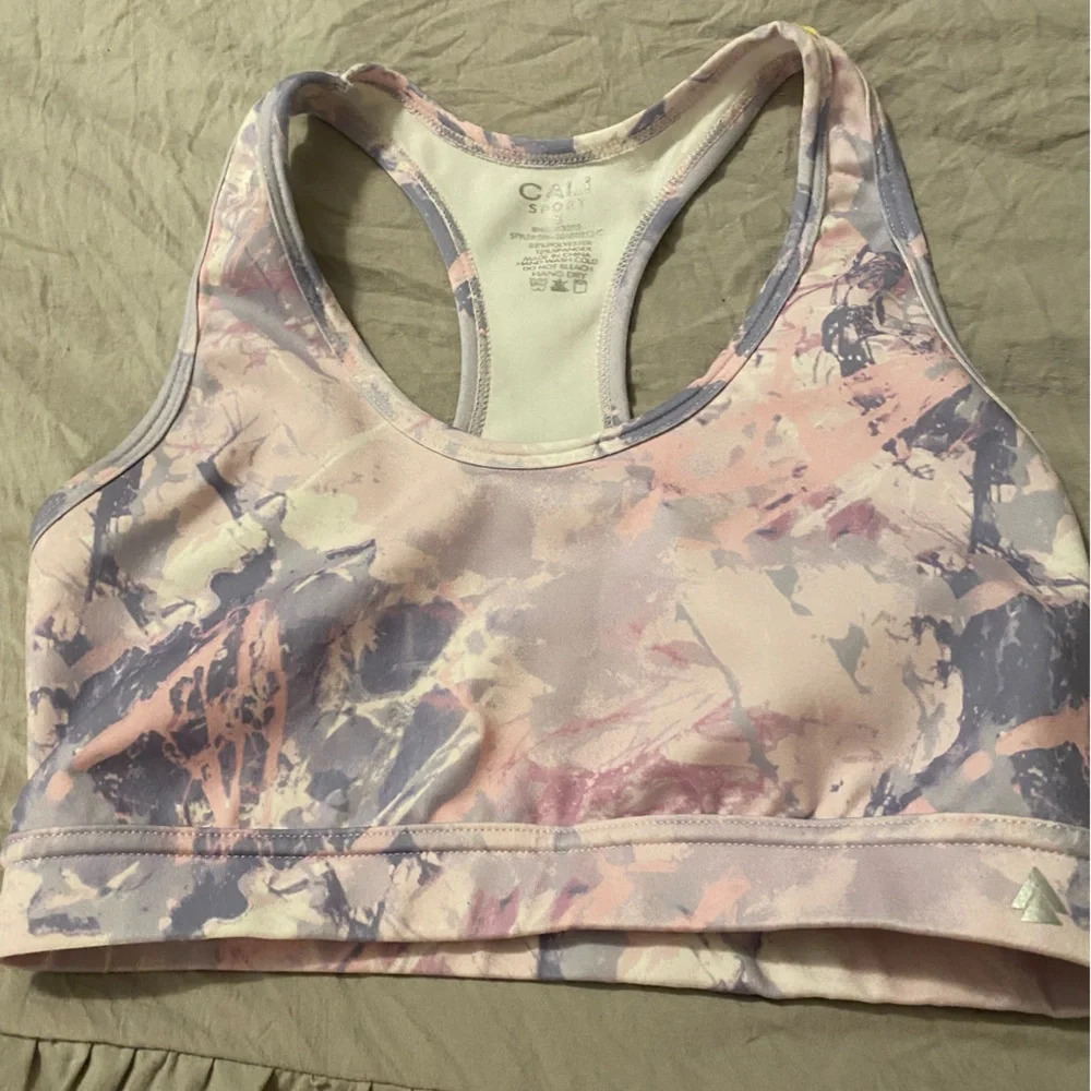 Cali sports bra racerback In Size small pink purple white cloud pattern
